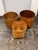 Design Plus Gallery presents a Set of Three Vintage Handwoven Wicker Baskets. Each basket has a rounded rim, tapered body,...
