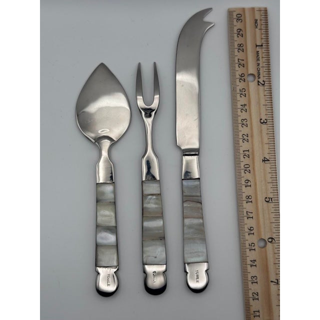 Details Elegant mid-century cheese and hors d’oeuvres serving set by Towle, featuring luminous mother-of-pearl inlaid...