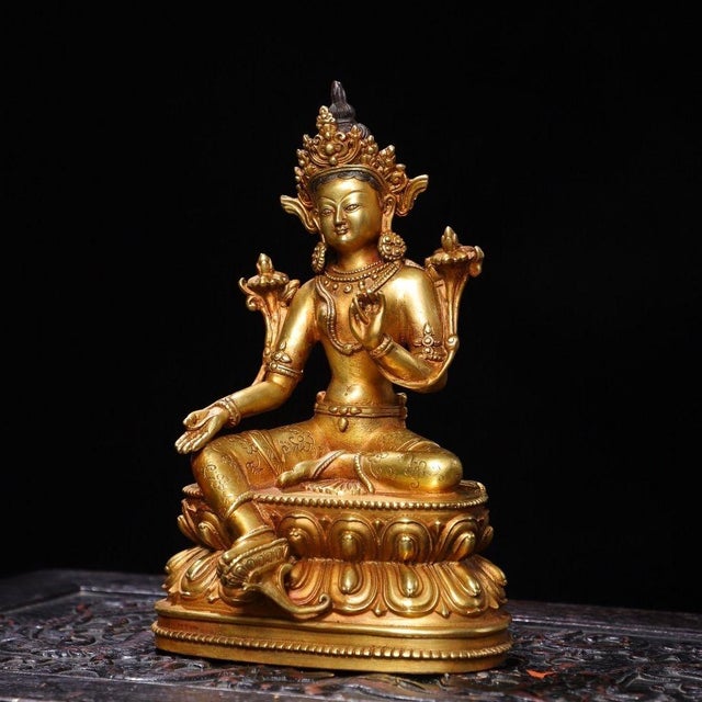 This is a finely cast vintage gilt-bronze statue of Green Tara, a beloved female Bodhisattva in Tibetan Buddhism known as...