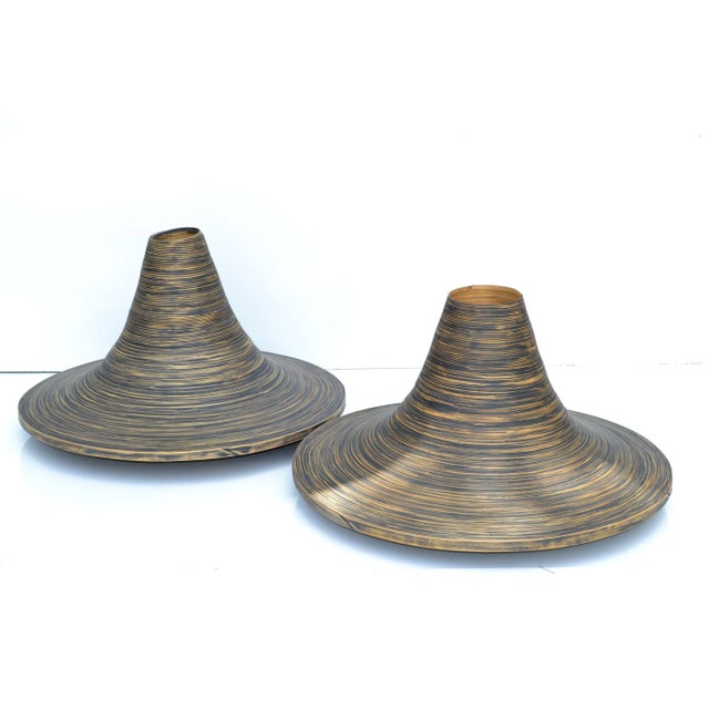 Dark Brown Finish decorative indoor planters in swirled cane into this cone shaped Vessel. Coming from a famous Florist in...