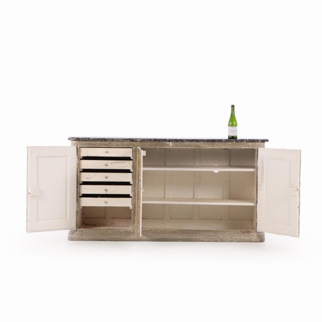 This antique Louis XV style buffet has a rustic finish and provides excellent storage with a great surface for serving or...