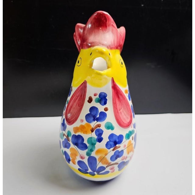 Mid-Century 10” Italian Deruta Hand-Painted Maiolica “Rooster of Fortune” Pitcher Add a splash of Mediterranean charm to...