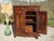 A very old wedding sideboard, entirely in solid walnut, traditionally made in France at the end of the 18th century....
