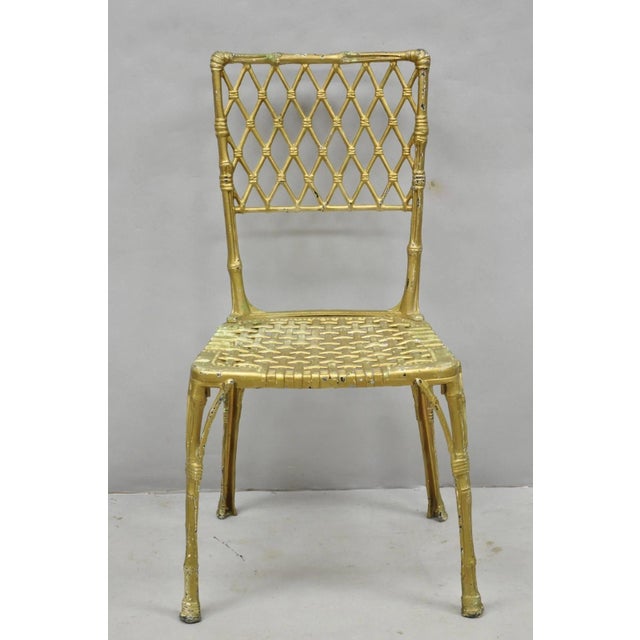 Vintage Hollywood Regency Faux Bamboo Basketweave Woven Lattice Cast Aluminum Side Chair, Made in Spain. Circa Late 20th...