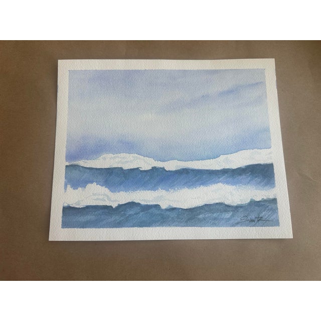 Quiet Horizon is an original watercolor celebrating the simple beauty of the sea beneath a soft, cloud-filled sky. Gentle...