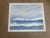 Quiet Horizon is an original watercolor celebrating the simple beauty of the sea beneath a soft, cloud-filled sky. Gentle...