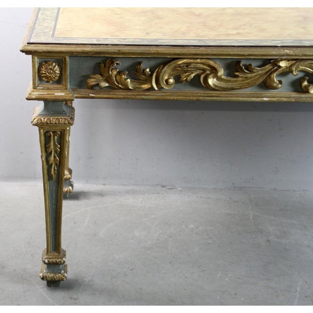 19th century Italian neoclassical carved green gilt and painted foyer table with faux-marble top. Highly decorative with...