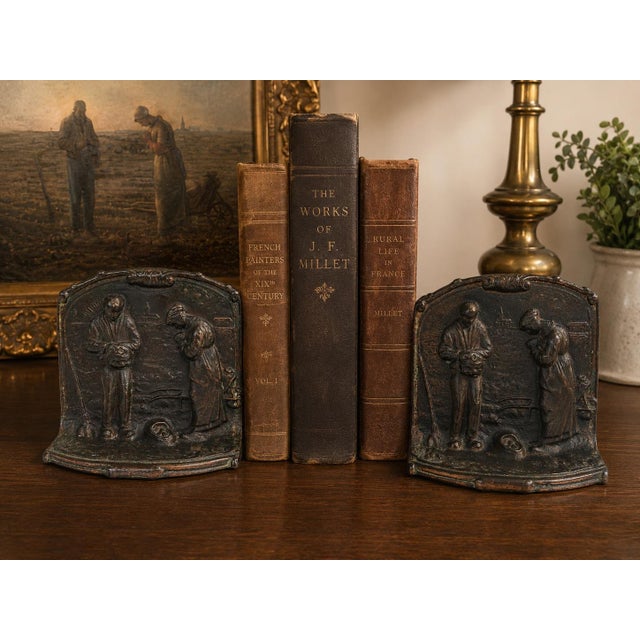 A charming pair of vintage cast iron bookends featuring a high-relief interpretation of Jean-François Millet’s iconic...