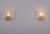 Pair of wall sconces, each fitted with a ribbed pressed glass globe in the style of toni zuccheri. Original 1970s edition....