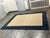 Design Plus Gallery presents a 7ft11in × 10ft Classic Wool Border Rug from Pottery Barn Teen. This rectangular area rug is...