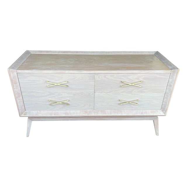 This vintage mid-century modern chest of drawers in a manner of Paul Frankl has been fully restored and refinished by our...