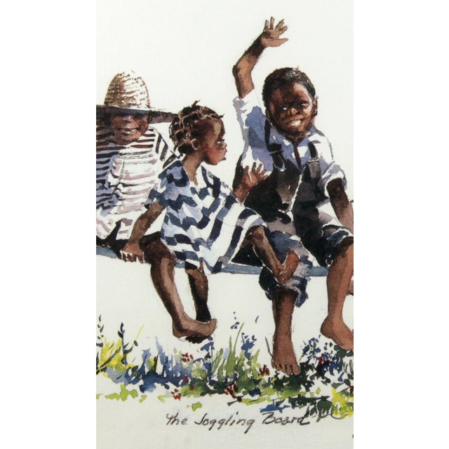 Charming Southern charm for your walls! This is a framed watercolor-style print titled "The Joggling Board" by Charleston,...