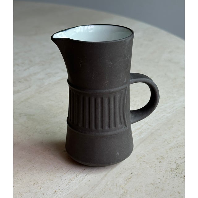 Jens Quistgaard for Dansk ceramic creamer, made in Denmark. This matte Brown piece is glazed on the inside with a glossy...