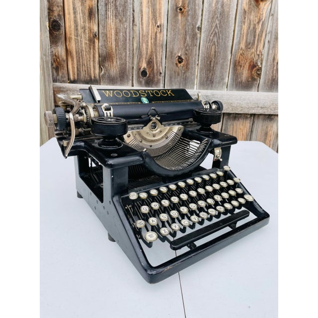 Excellent early 20th Century industrial typewriter. Classic old typewriter design and patina with floating keys, perfect...