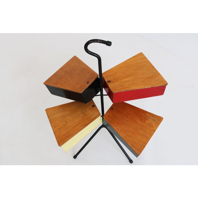 A striking and highly collectible sewing box stand designed by Joost Teders for Metalux, dating from the 1950s. This...
