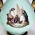 A distinguished pair of Old Paris Porcelain Egyptian Revival vases, dating to approximately 1880, embodying the profound...