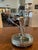 This is a vintage (1960's) Godinger silver-plated epergne centerpiece featuring a central trumpet-style flower vase...