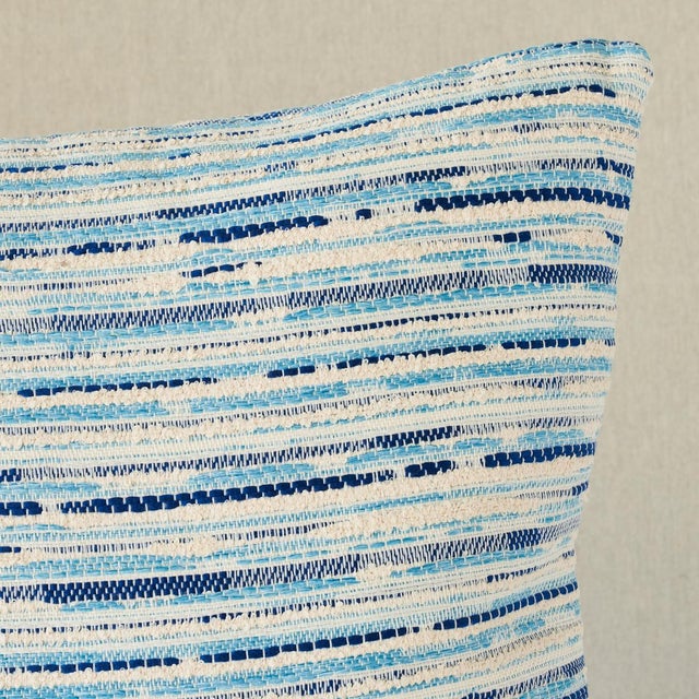 This pillow features Tomori Indoor/Outdoor with a knife edge finish. An irregular textural weave of chunky twisted bouclé...
