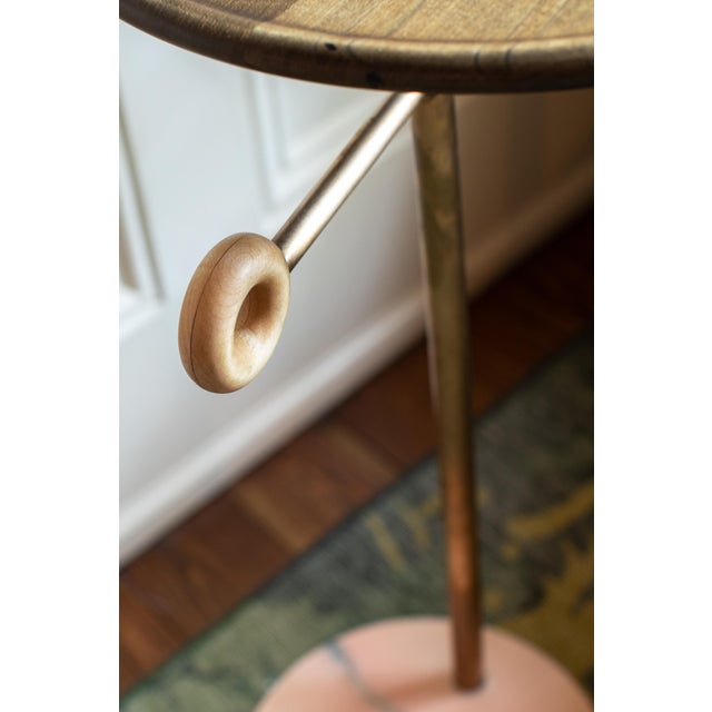 Carved wood handle and top with brass leg and pink marble base occasional table USA, 2019 dark oak, brass, pink marble...