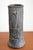 Art Nouveau flower vase with a continuous floral relief motif, cylindrical in shape, and a slightly flared base. The vase...