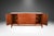 Vintage, circa early 1960s, Walnut credenza, dresser, this absolute jewel remains in nearly pristine condition. The...