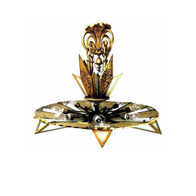 This exceptional Art Deco chandelier is one of those rare objects capable of defining an entire interior on its own. Far...