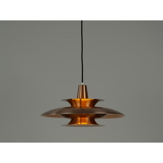 Vintage aluminum lamp designed for the Danish Fog og Morup. Dimensions: Diameter: 44cm Height: 20cm The lamp is in very...