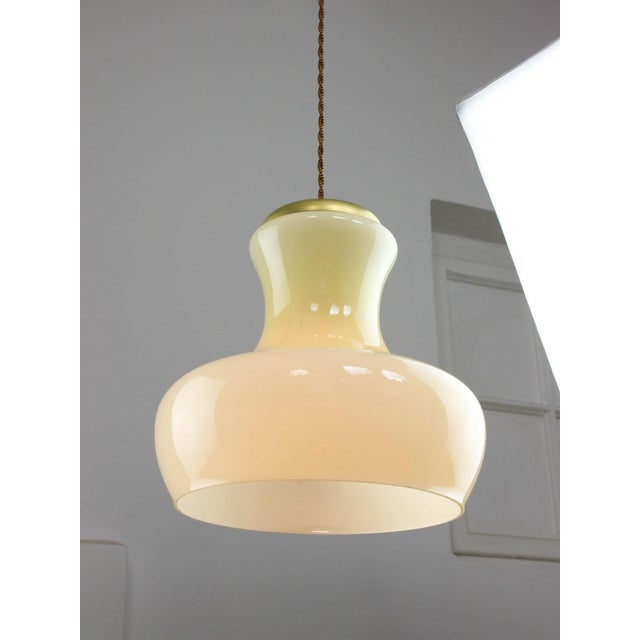 Lamp's cover is made of genuine brass material complementing this vintage item nicely with it's golden colour. total...