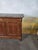 Small Louis-Philippe period mahogany sideboard with marble top This elegant small Louis-Philippe period sideboard is...