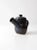 This is a signed studio pottery tea or coffee pot. The hand-crafted pottery server features a deep navy blue glaze with an...