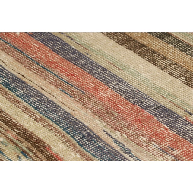 Hand-knotted in wool and originating from Turkey circa 1960 – 1970, this 2x3 vintage Zeki Müren rug is a unique addition...