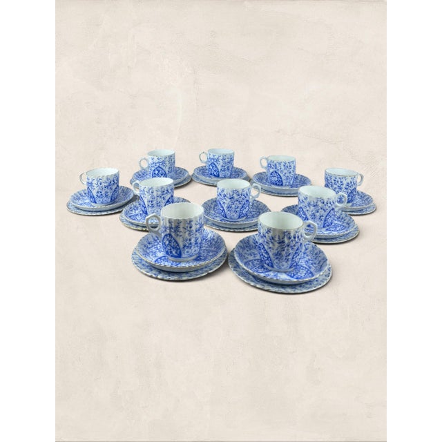 An exquisite late Victorian English tea service comprising thirty matching pieces, including ten tea cups, ten saucers,...
