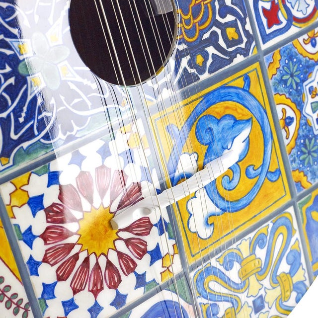 The Azulejo I Portuguese Guitar is a tribute to the artistic expression of a nation. The history of the people is...