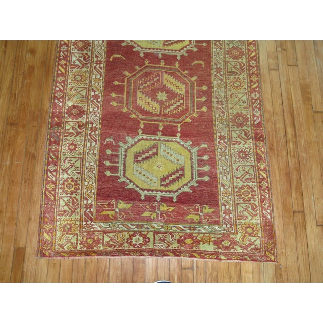 Antique Turkish Sivas rug in reds, brown, blues and mustard. 3'10'' x 6'