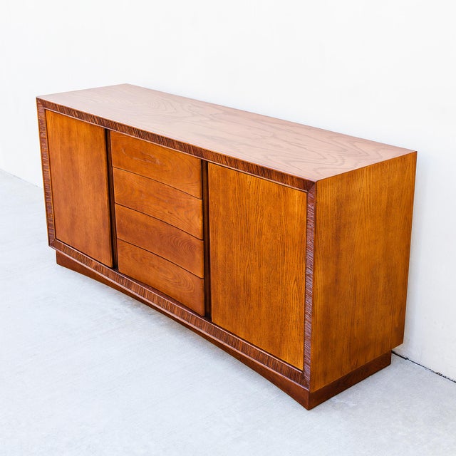 A newly refinished ashwood buffet / credenza by Brown Saltman, made in Southern California c. late 1950s with design...
