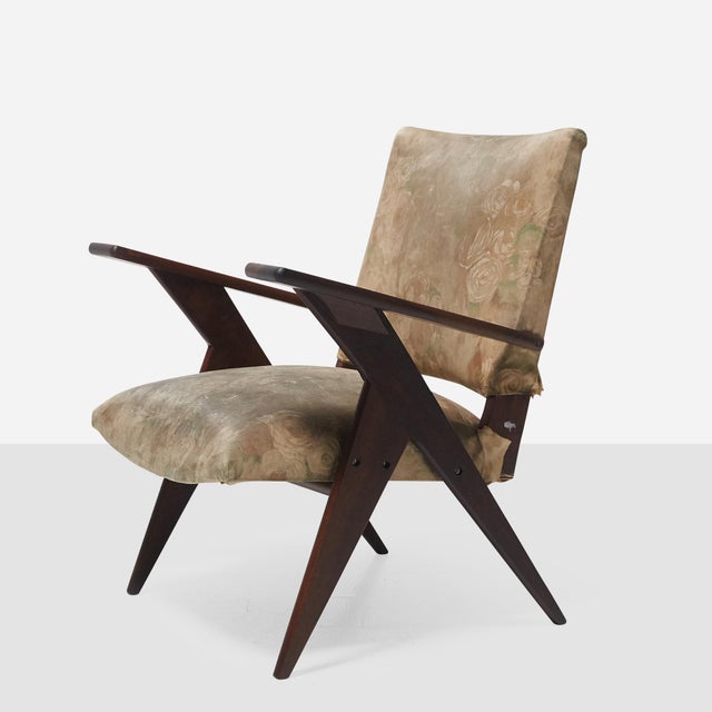 Armchair by José Zanine Caldas Brazil, 1950s A Brazilian hardwood armchair by José Zanine Caldas with paddle arms and his...