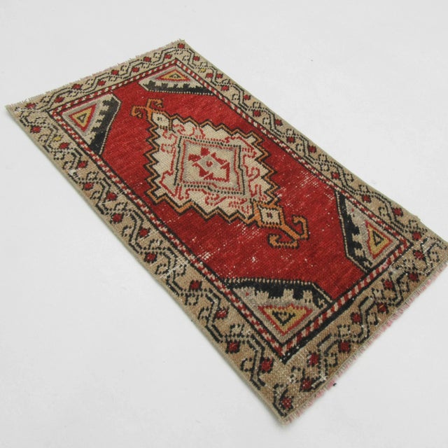 Vintage handknotted decorative mini rug from Konya region of Turkey. Approximately 50-60 years old. In very good condition.