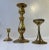 A trio of solid brass candlesticks manufactured in Scandinavia during the 1960s and 1970s. The candlesticks are to be...