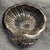 Beautiful mid-century silver plated shell dish. So shiny and a stunning way to present small collectibles.