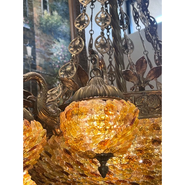 Magnificent, large-scale 2-tiered chandelier. A show-stopping Venetian-style chandelier with a heavily cast bronze frame....