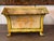 Pair of French tole cachepots of rectangular flared form, painted in yellow with green line borders framing pale panels...
