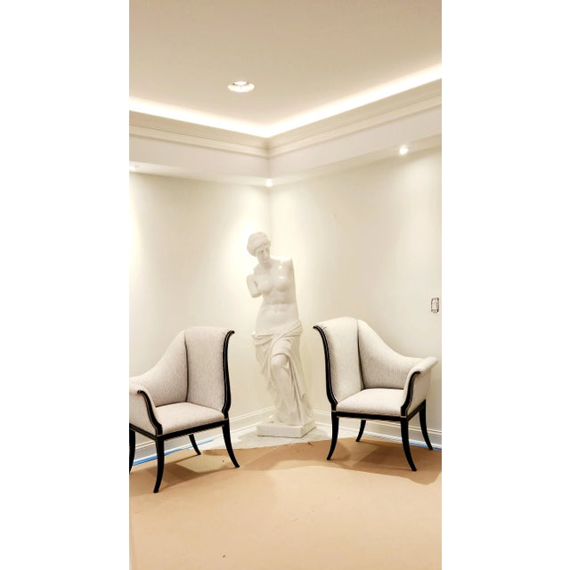 Karges regency chairs, with tags. Beautiful black lacquered chairs, left and right Parler Deux settes. The chairs are...