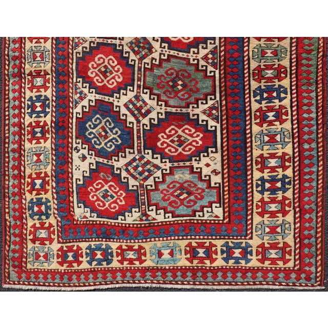 Textile Antique Moghan Kazak Rug Showcasing Bold Geometric Medallions 4'6 X 6' For Sale - Image 7 of 11