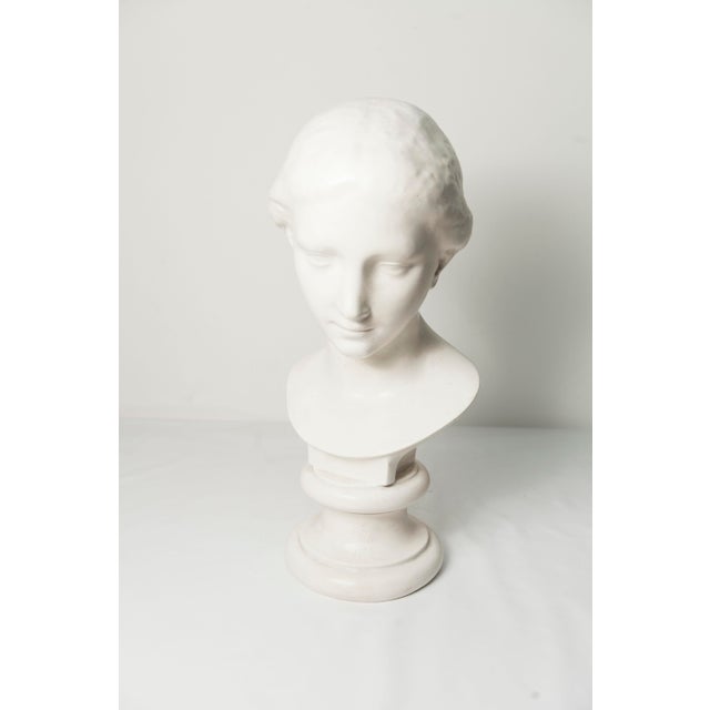 Bust of a woman in white marble, signed Louvre Museum 1445, in very good condition. The marble is very clean and unmarked....