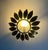 Large Spanish sunburst light in gilt metal and frosted glass, green; white; orange\.\.\.\.other color Spain, 1950s....
