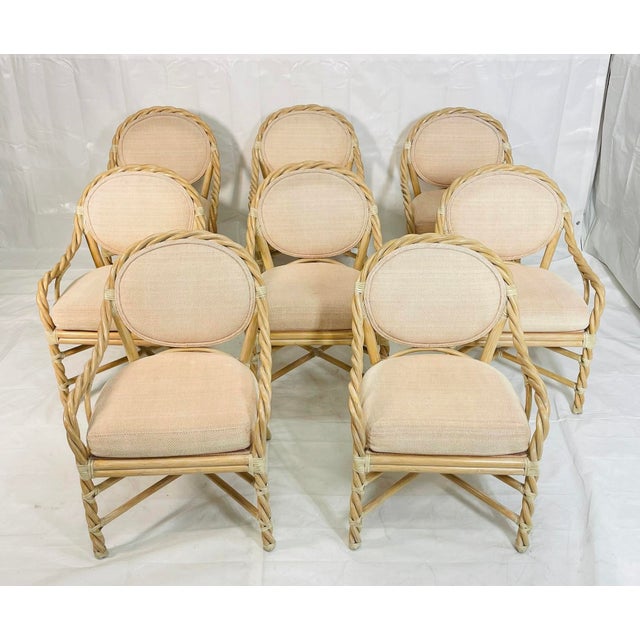 A rare and highly desirable group of vintage bamboo dining armchairs by McGuire Furniture, designed and manufactured in...