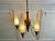 An exceptionally rare five-arm chandelier designed by Bent Karlby for Lyfa, Denmark, dating to the 1960s. A sculptural and...