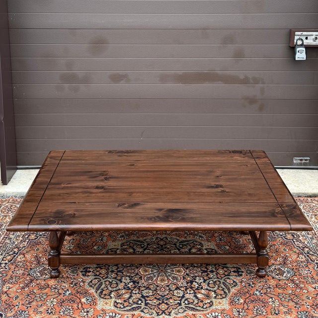 A late 20th century Ethan Allen Old Tavern Antiqued Pine collection Rustic Traditional solid pine drop leaf coffee table....