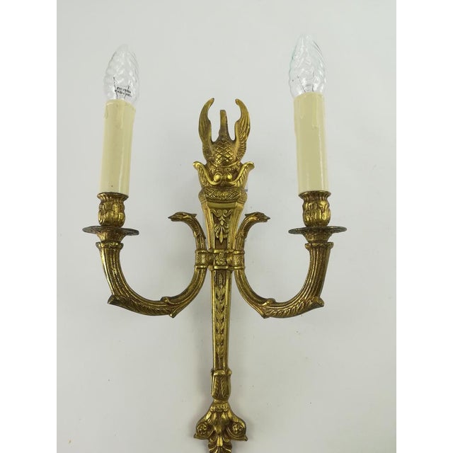 Pair of fire-gilded bronze lamps in French Empire style. Re-wired to modern safety standards. Fitting E14 European Plug...