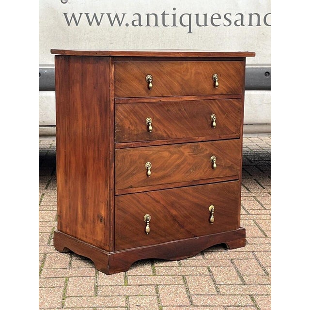 Mahogany Bachelor Chest Of Drawers Sizes 66.5 cms wide, 41 cms depth, 78.5 cms high. Very good quality, with brass...